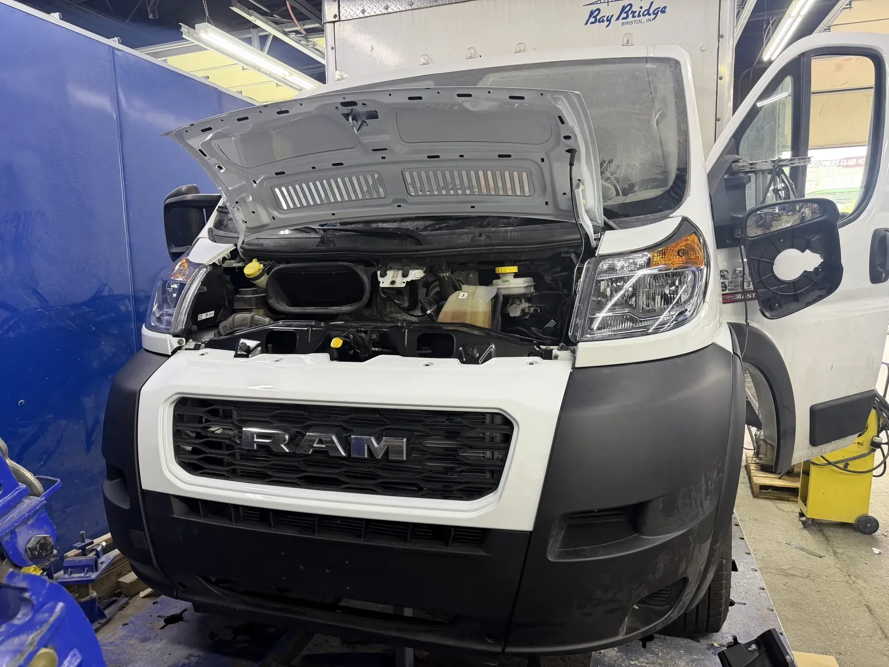 Ram box truck: Bumper and lights going back on.