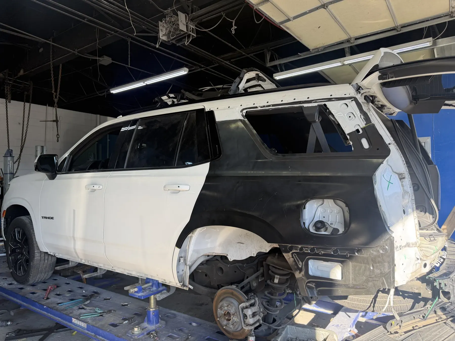 Chevy Tahoe: Quarter panel and hatch removed.